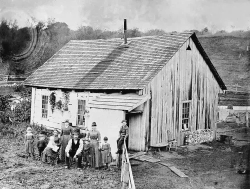 vintage photo of family in the "slabtown" area of Traverse City, MI