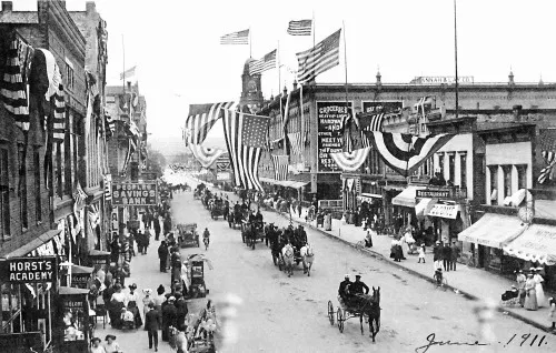 Pre-automobile era vintage photo of parade in Traverse City, MI